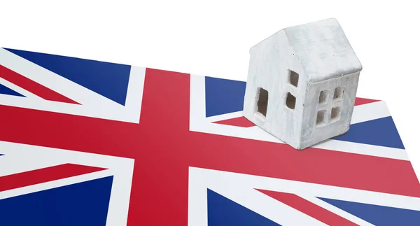 Casa pequena em uma bandeira - Reino Unido — Fotografia de Stock