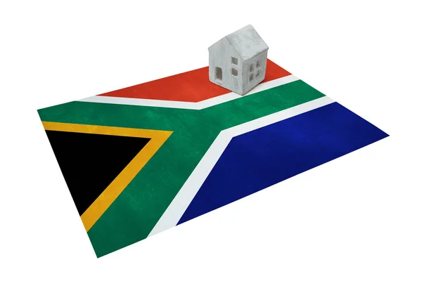 Litet hus på en flagga - Sydafrika — Stockfoto