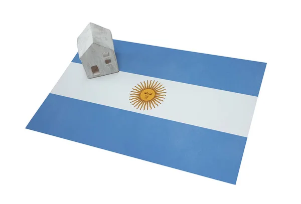 Litet hus på en flagga - Argentina — Stockfoto
