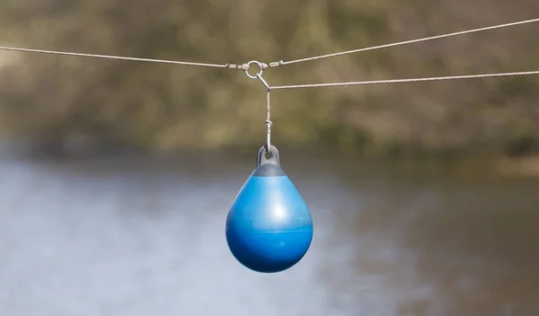 BLue buoy hanging out to dry — Stock Photo, Image