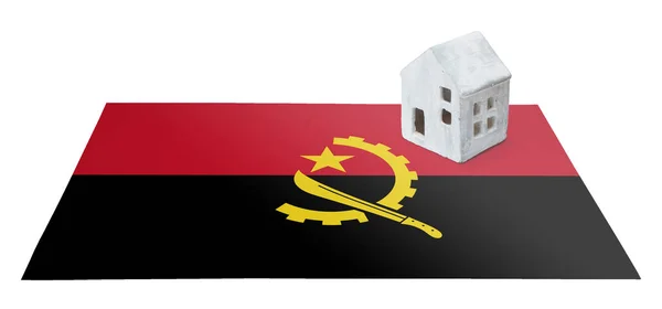 Huisje op een vlag - Angola — Stockfoto