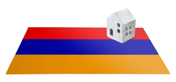 Litet hus på en flagga - Armenien — Stockfoto