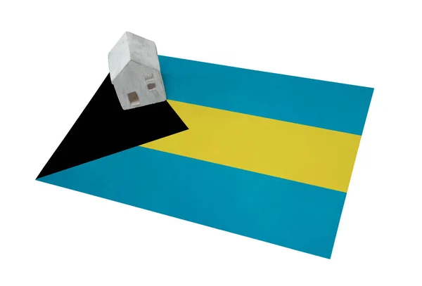 Small house on a flag - Bahamas — Stock Photo, Image