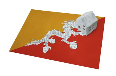 Bir bayrak - Bhutan üzerinde küçük ev