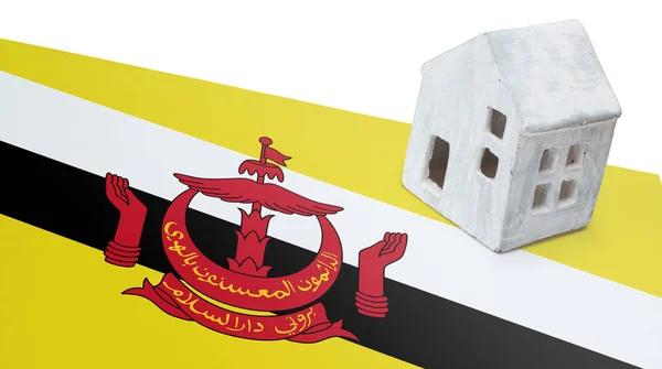 Pequeña casa en una bandera - Brunei —  Fotos de Stock
