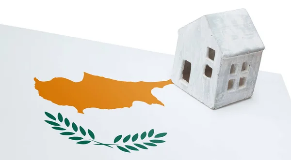 Small house on a flag - Cyprus — Stock Photo, Image