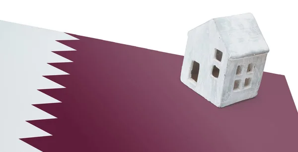 Litet hus på en flagga - Qatar — Stockfoto