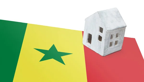 Huisje op een vlag - Senegal — Stockfoto