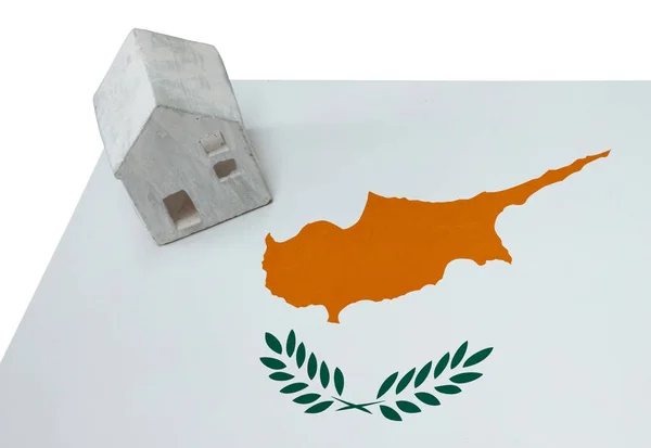 Small house on a flag - Cyprus — Stock Photo, Image