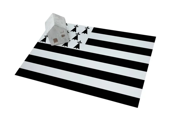 Piccola casa su una bandiera - Bretagna — Foto Stock