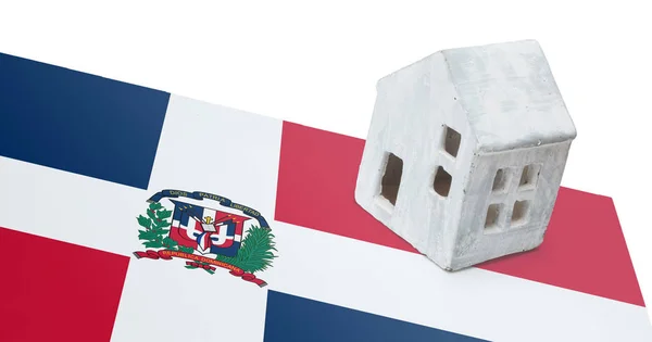 Small house on a flag - Dominican Republic — Stock Photo, Image