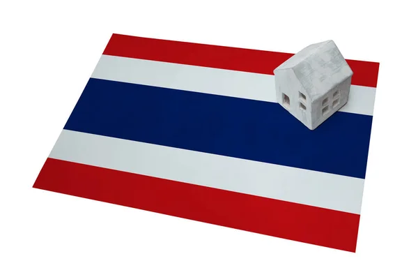 Small house on a flag - Thailand — Stock Photo, Image