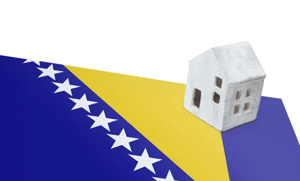 Litet hus på en flagga - Bosnien Hercegovina — Stockfoto