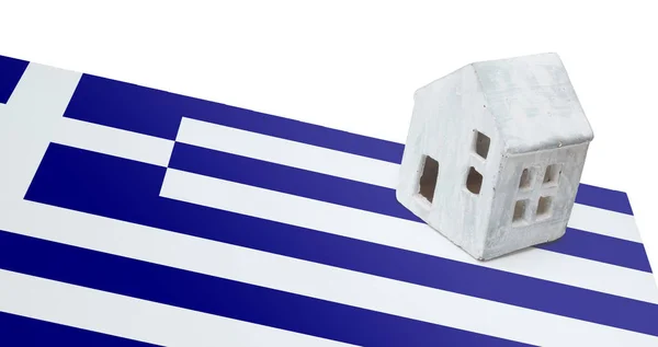 Piccola casa su una bandiera - Grecia — Foto Stock