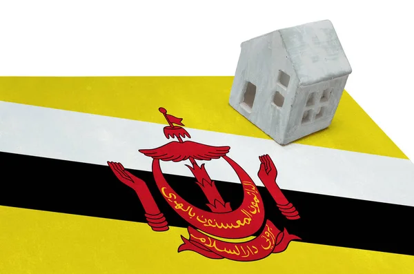 Litet hus på en flagga - Brunei — Stockfoto