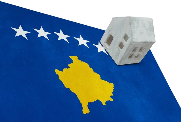 Small house on a flag - Kosovo — Stock Photo, Image