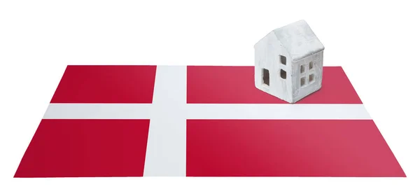 Small house on a flag - Denmark — Stock Photo, Image