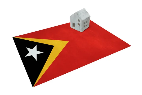 Маленький дом на флаге - Восточный Тимор — стоковое фото