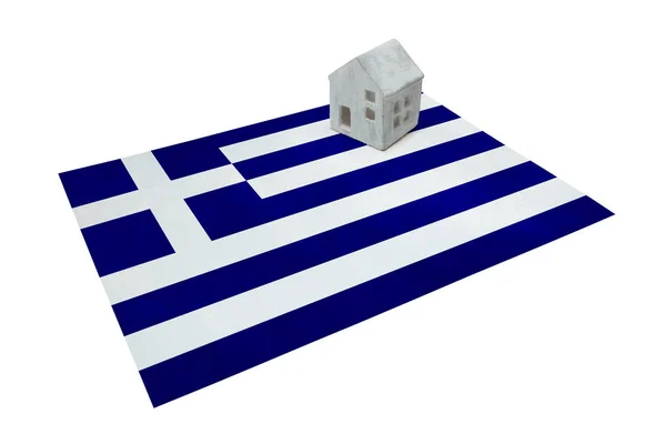 フラグ - ギリシャ上の小さな家 — ストック写真