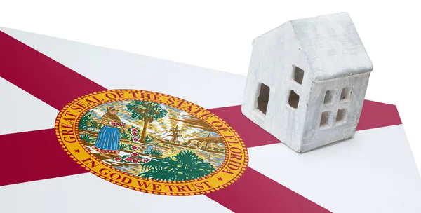 Pequeña casa en una bandera - Florida — Foto de Stock