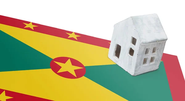 Small house on a flag - Grenada — Stock Photo, Image
