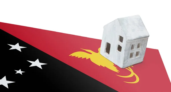 Huisje op een vlag - Papoea-Nieuw-Guinea — Stockfoto