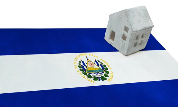 Small house on a flag - El Salvador — Stock Photo, Image