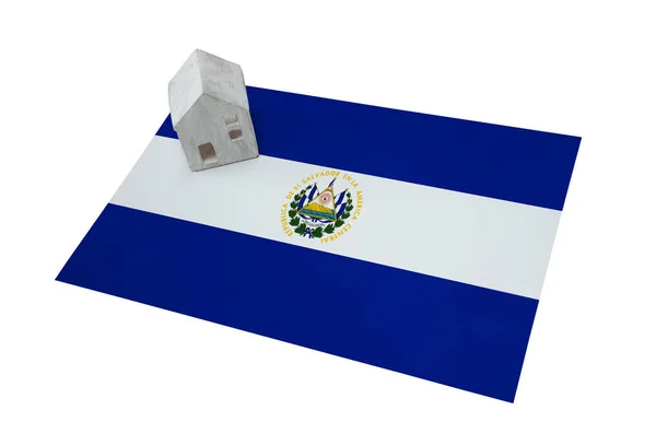 Small house on a flag - El Salvador — Stock Photo, Image