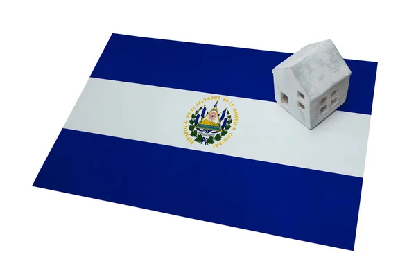 Small house on a flag - El Salvador — Stock Photo, Image