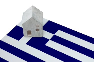 Bir bayrak - Yunanistan üzerinde küçük ev