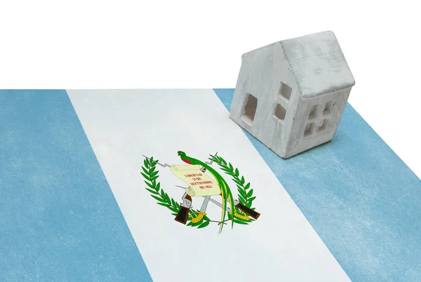 Litet hus på en flagga - Guatemala — Stockfoto