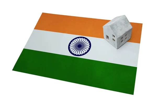 Small house on a flag - India — Stock Photo, Image