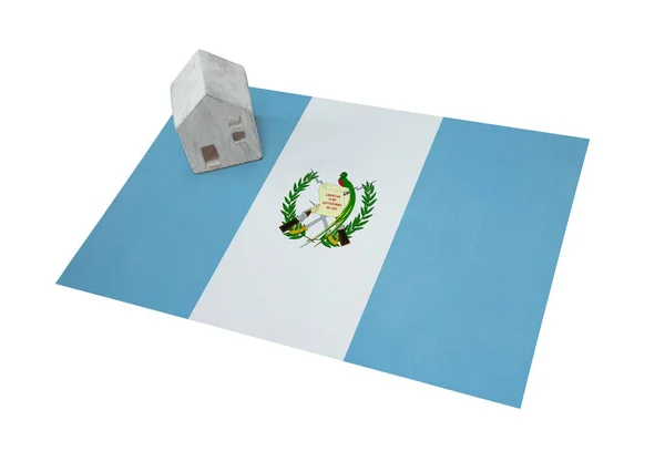 Small house on a flag - Guatemala — Stock Photo, Image