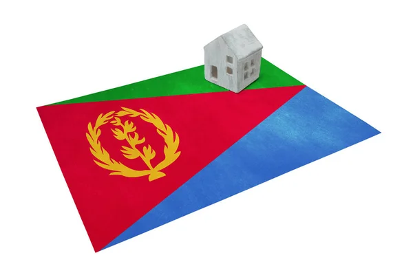 Small house on a flag - Eritrea — Stock Photo, Image