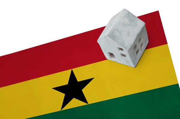 Small house on a flag - Ghana — Stock Photo, Image