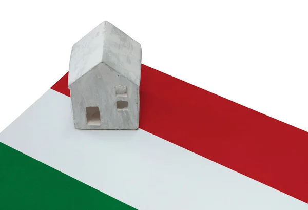 Small house on a flag - Hungary — Stock Photo, Image