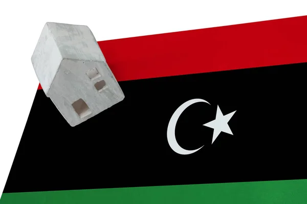 Small house on a flag - Libya — Stock Photo, Image