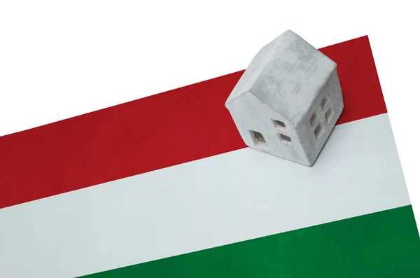 Small house on a flag - Hungary — Stock Photo, Image