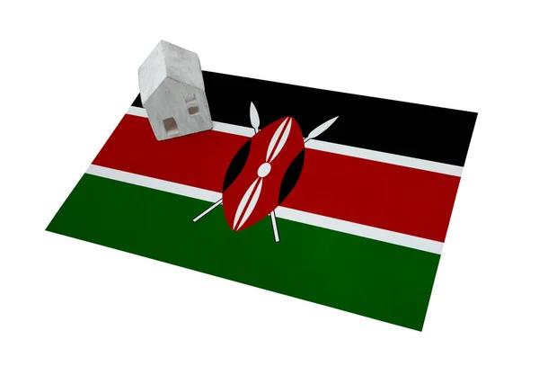 Small house on a flag - Kenya — Stock Photo, Image