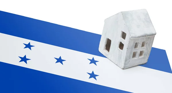Kleines Haus auf einer Fahne - honduras — Stockfoto