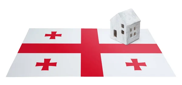 Kleines Haus auf einer Fahne - Georgien — Stockfoto
