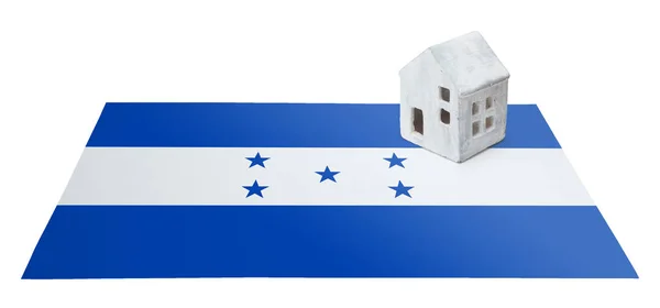Litet hus på en flagga - Honduras — Stockfoto