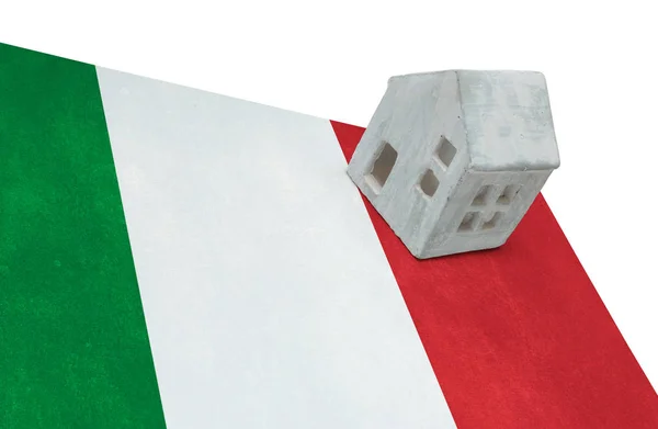 Small house on a flag - Italy — Stock Photo, Image