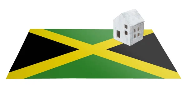 Маленький дом на флаге - Ямайка — стоковое фото