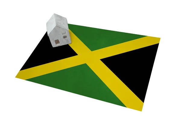 Маленький дом на флаге - Ямайка — стоковое фото