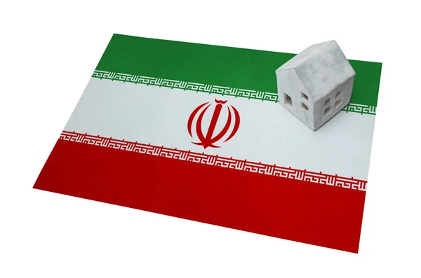 Litet hus på en flagga - Iran — Stockfoto