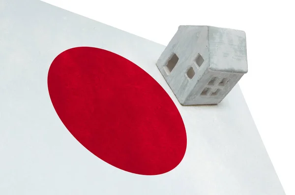 Bir bayrak - Japonya üzerinde küçük ev — Stok fotoğraf