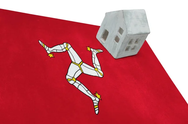 Small house on a flag - Isle of Man — Stock Photo, Image