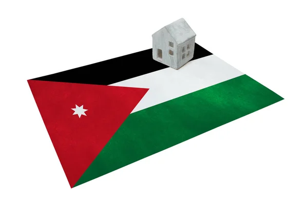 Bir bayrak - Jordan üzerinde küçük ev — Stok fotoğraf