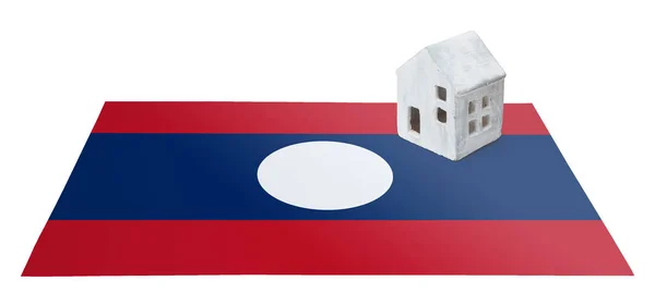 Маленький дом на флаге - Лаос — стоковое фото